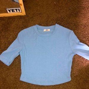 Pastel blue elbow reach shirt